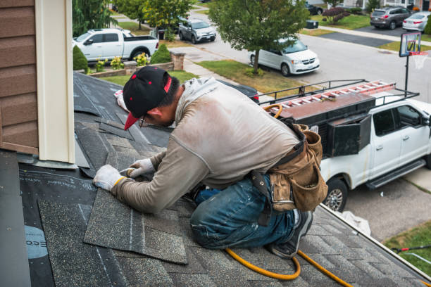Professional Storm Damage Roof Repair technician working in Gilcrest, CO